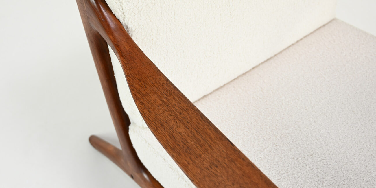 This elegant pair of armchairs, designed by Edvard Valentinsen and manufactured by Fraska in the 1960s, exemplifies the elegance and innovation of mid-century Danish design.