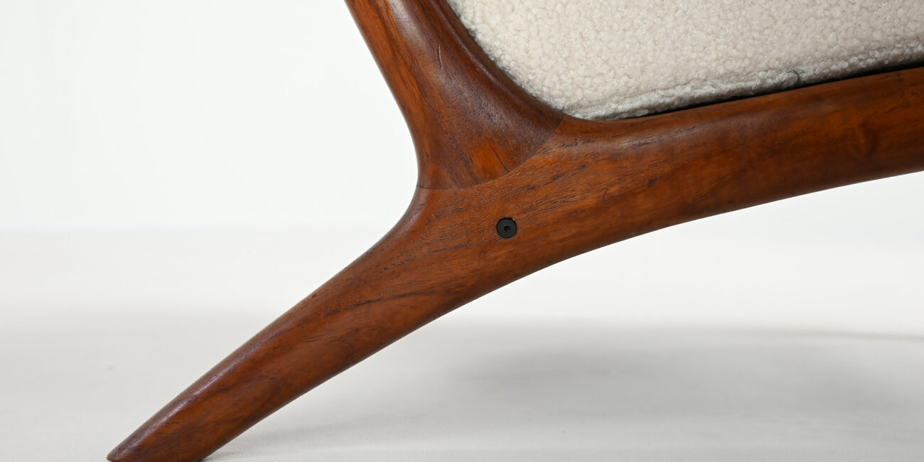 This elegant pair of armchairs, designed by Edvard Valentinsen and manufactured by Fraska in the 1960s, exemplifies the elegance and innovation of mid-century Danish design.