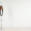 Sculptural floor lamp, by Italian designer Goffredo Reggiani during the 60's. Structure made of steel resting on a round carrare marble base and supporting an ovoid shaped orientable copper reflector with an acrylic glass diffuser.