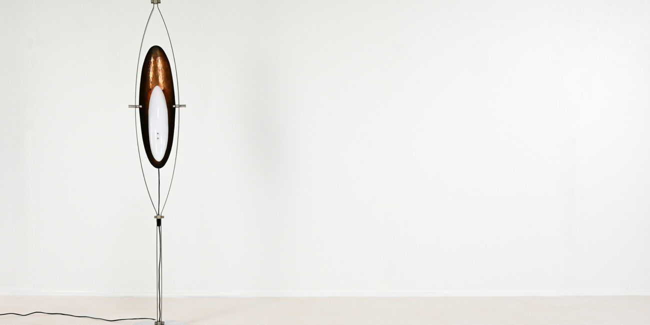 Sculptural floor lamp, by Italian designer Goffredo Reggiani during the 60's. Structure made of steel resting on a round carrare marble base and supporting an ovoid shaped orientable copper reflector with an acrylic glass diffuser.